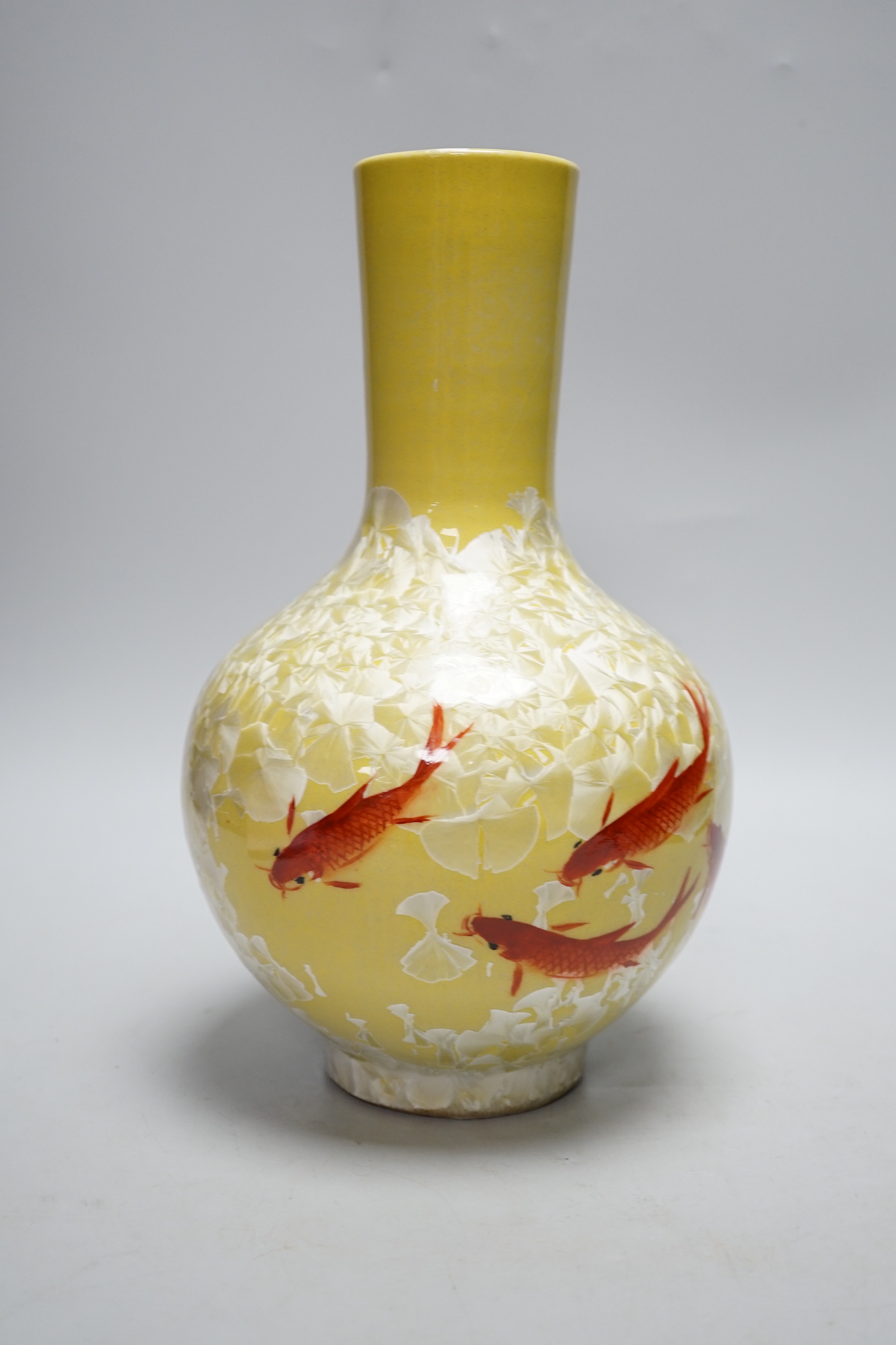 A Japanese glazed vase on yellow ground with carp decoration, 28cm